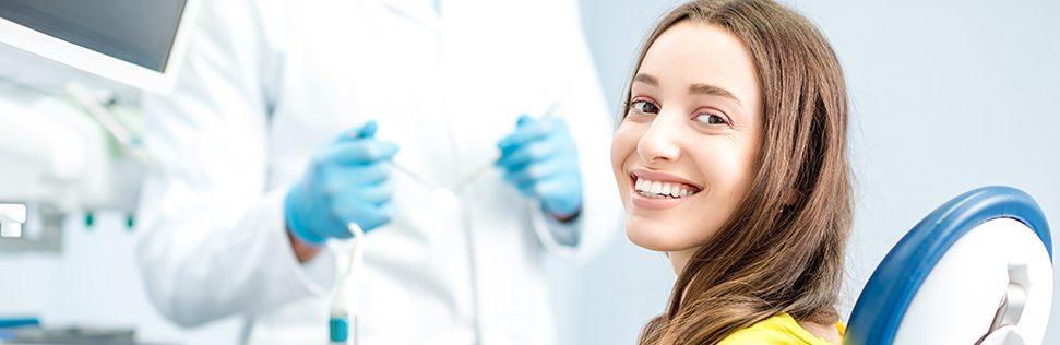 woman smiling in dentist chair